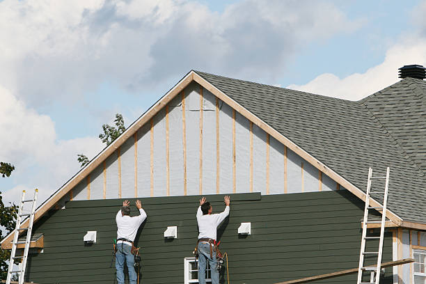 Professional Siding technician working in Clinton, NC